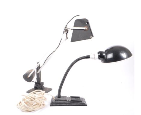 Two 20th century industrial machinists factory desk lamps. One lamp having a gooseneck design, with domed shade, sat on a cas