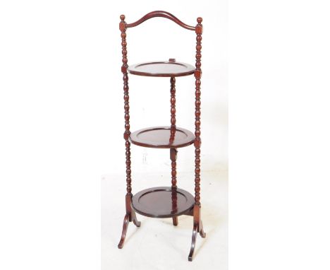 An early 20th century circa 1920s William &amp; Mary revival bobbin support three tier cake stand. The cake stand having thre