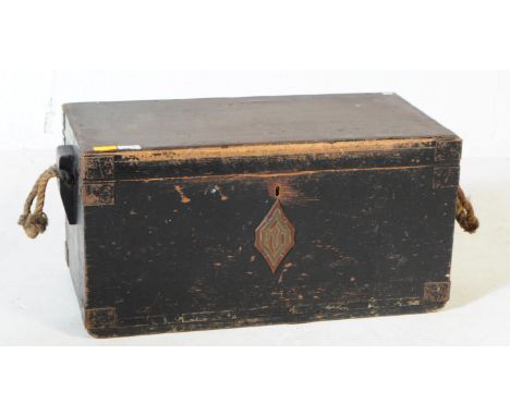 A 19th century Victorian ebonised oak wood campaign carpenters chest trunk. The chest of rectangular form with metal banding 