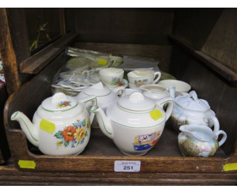 Various doll's house teawares, including teapots, teacups, saucers and plates