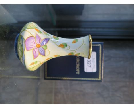 A Moorcroft Enamel floral vase, similar to the previous lot, dated 6 Nov 2001, 8cm high, in original case