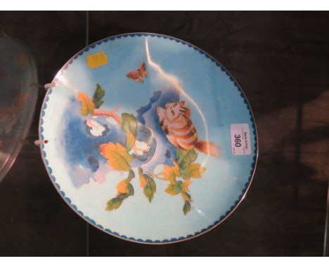 A vintage Chinese Cloisonne plate with a cat stalking a butterfly, 23cm diameter