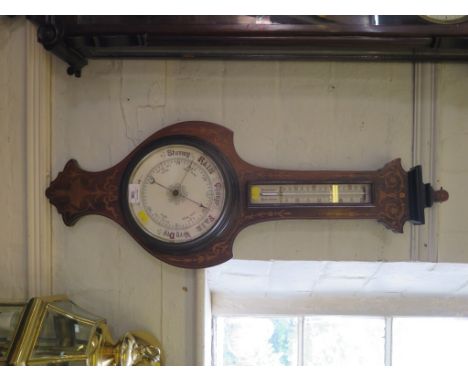 An Edwardian inlaid rosewood banjo barometer, of shield shape with thermometer and ceramic dial 85cm high