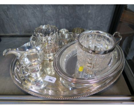 A miscellaneous collection of silver plate to include  ice bucket, oval tray, wine bottle holder, sauce boat, cream jug, egg 