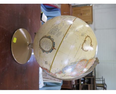 A Replogle World Classic Series 12" diameter globe with metal base