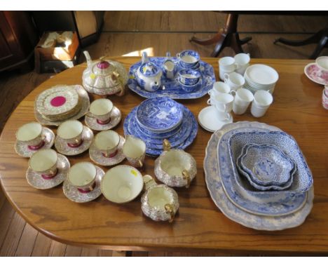 A Copeland Spode Italian pattern meat plate 37cm wide, other plates and bowls in the same pattern, a Royal Stafford gilded te