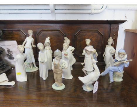 Five Lladro figures, including one from the Privilege series and seven Nao figures (12)