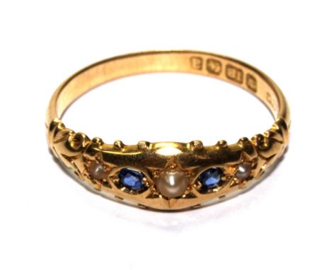 A five stone sapphire and pearl ring set in 18 carat gold