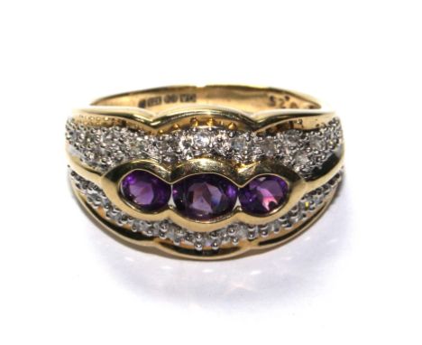 A 9 carat gold turban ring set with diamonds and amethyst