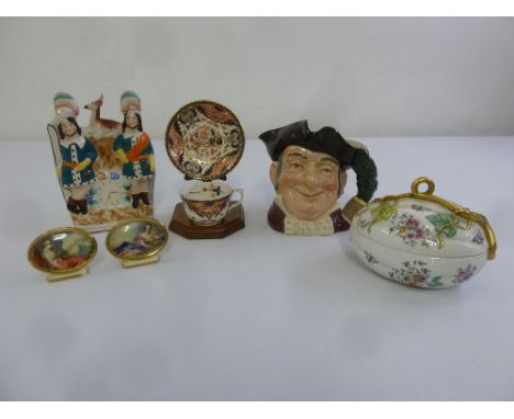 A quantity of porcelain  to include a pair of Meakin portraits, a Royal Crown Derby Imari cup and saucer on stand, a Portugue