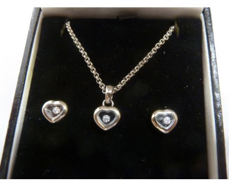 Chopard ladies 18ct white gold heart shaped floating diamond necklace and matching earrings