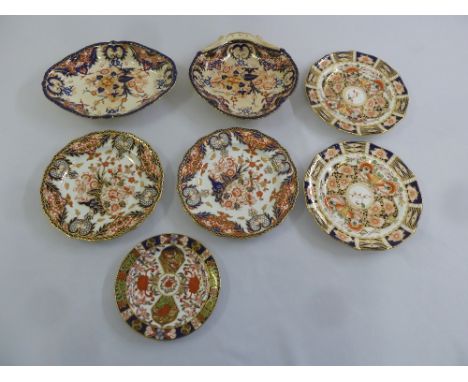 Royal Crown Derby five plates and two decorative bowls