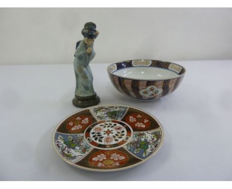 A Lladro model of a geisha, an Oriental style bowl and plate