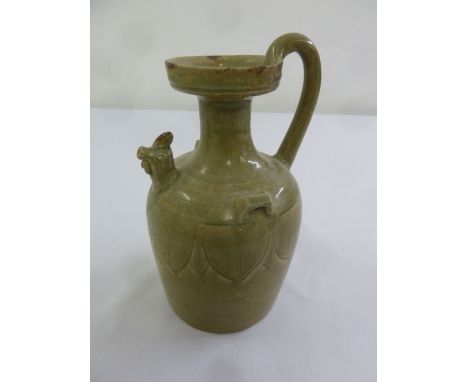 Chinese celadon glazed wine ewer with scroll handle circa 1850