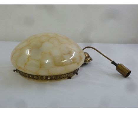 An early 20th century glass and brass ceiling light