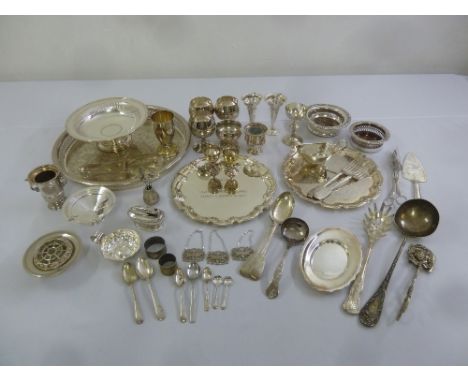 A quantity of silver plate to include trays, dishes, vases and flatware