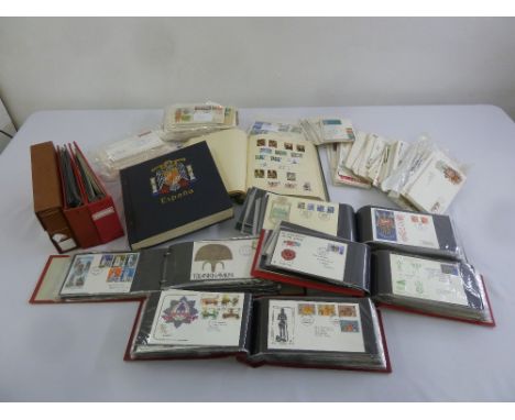 A quantity of stamps to include two albums of first day covers