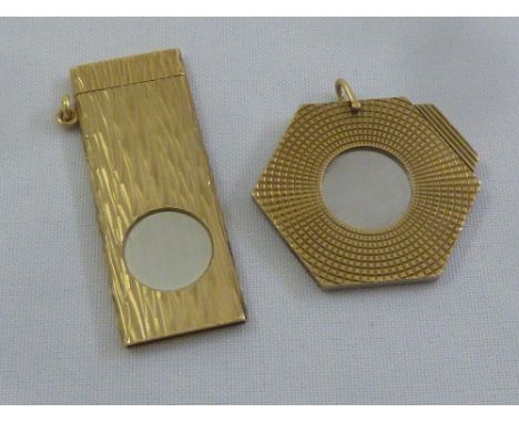 Two 9ct gold engine turned cigar cutters with steel blades