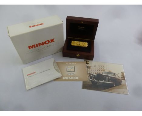 Minox AX gold (spy camera) serial no. AX1-007 in original packaging