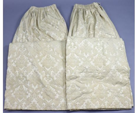 A pair of cream two-tone lined &amp; interlined curtains with all-over repeating foliate &amp; scroll design, 124” wide x 101