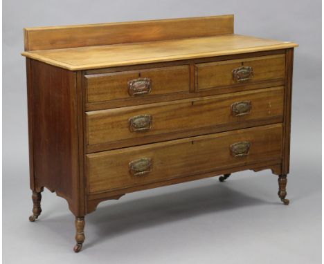 A late Victorian walnut low chest fitted two short &amp; two long graduated drawers with brass swing handles, on turned feet 