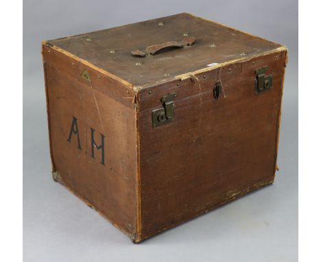 A vintage canvas-covered &amp; leather-bound travelling trunk with a hinged lift-lid revealing fitted interior, 23½” wide x 2