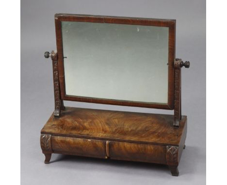 A Georgian mahogany swing toilet mirror with rectangular plate on fluted supports &amp; bow-front base fitted three drawers w