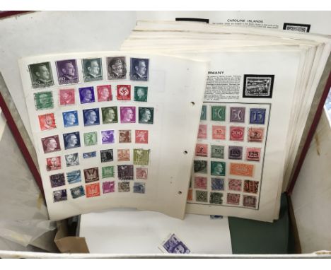 A collection of stamp albums loose stamps and First day covers.