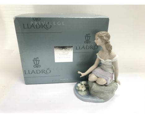 A boxed Lladro figure of a lady by a riverbed, 'El Sueno de Helena: Reflections of Helena'.