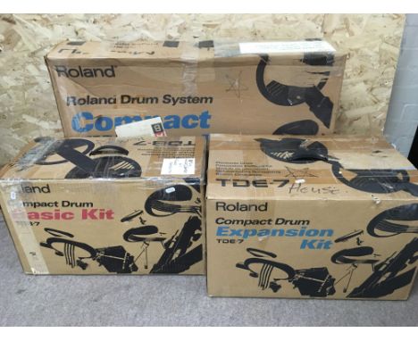 A Roland TD7 stereo electonic drumkit with original boxes and manual.