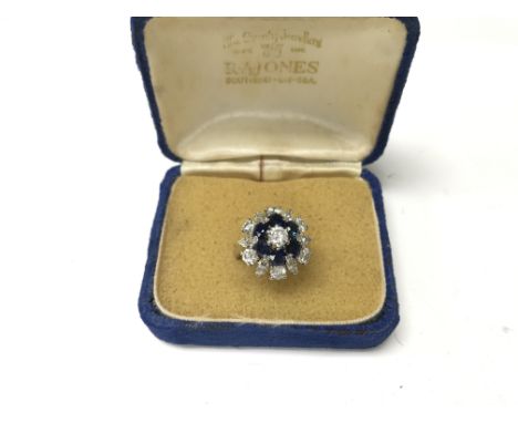 A sapphire and diamond ring. Weight approx 6.8g, size approx K