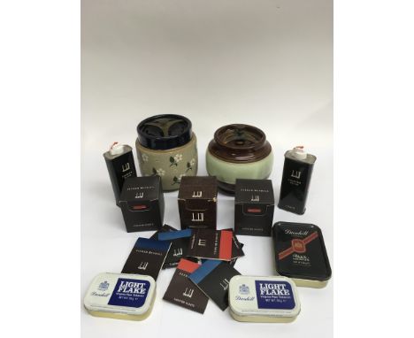 Two stoneware tobacco jars and Dunhill lighter items