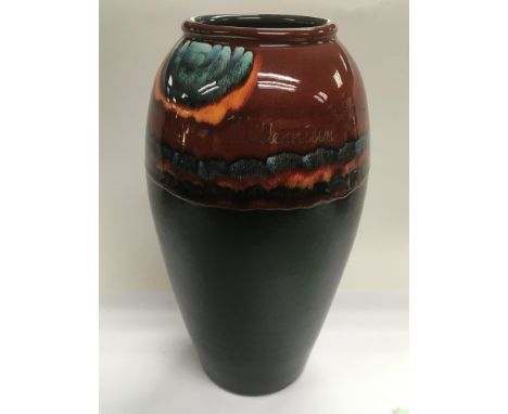 A limited edition modern Poole pottery vase of modern design titled 'Millenium', approx height 33cm.