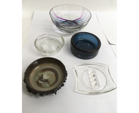 A Caithness style striped glass bowl with other examples and a lava pottery dish