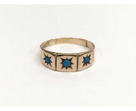 A Victorian 9ct gold ring set with three turquoise stones. Ring size approx Q, total weight approximately 1.6 grams.