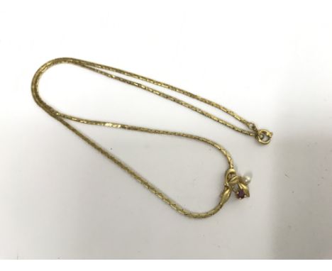 A ruby and pearl 9ct gold plated K&amp;L necklace.