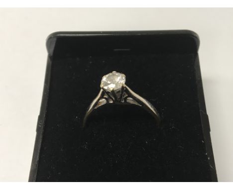 A unmarked single diamond solitaire ring approx 0.5 ct size P