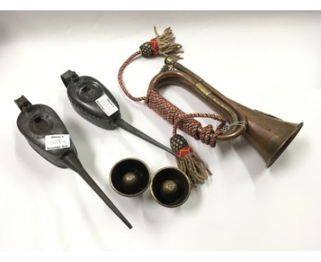 A military bugle, two military ashtrays and two military oil cans