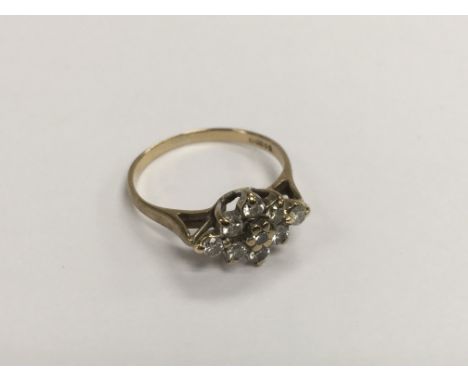 A 9ct gold nine stone diamond ring, approx 2g and approx size J-K.