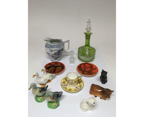 A Mary Gregory green glass decanter, two Poole Delphis pin dishes, a Coalport cup and saucer and other items