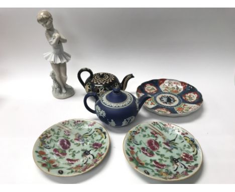 A collection of ceramics including celadon dishes, a nao figure and Wedgwood etc.