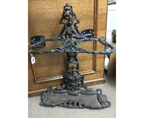 A Victorian cast iron stick stand of naturalistic design.