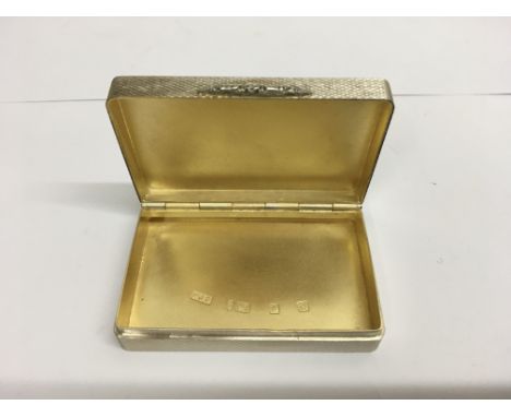 A turned 925 silver gilt snuff box in fitted case, London hallmarks.Approx 4x6.5cm.Initialled to reverse