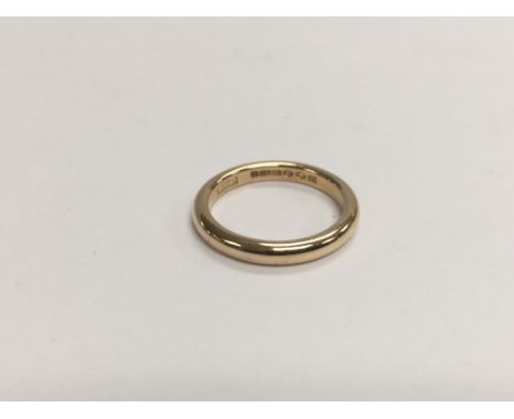 A 9ct gold wedding band, approx 3g and approx size J-K.