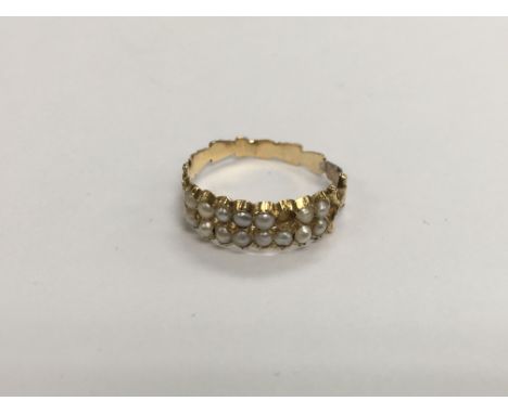 An antique gold and pearl ring with one pearl missing, approx 2g and approx size K.