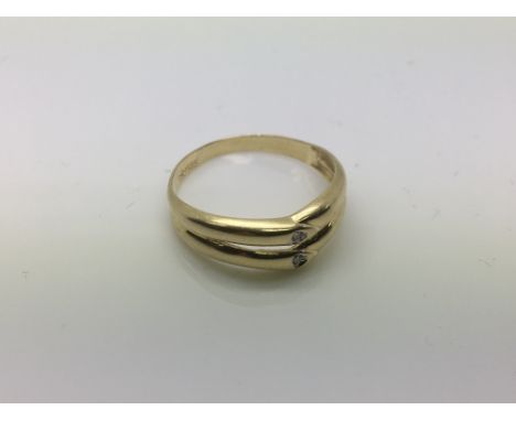 A 14ct double wishbone ladies ring set with two diamonds, approx 1.6g and approx size P.
