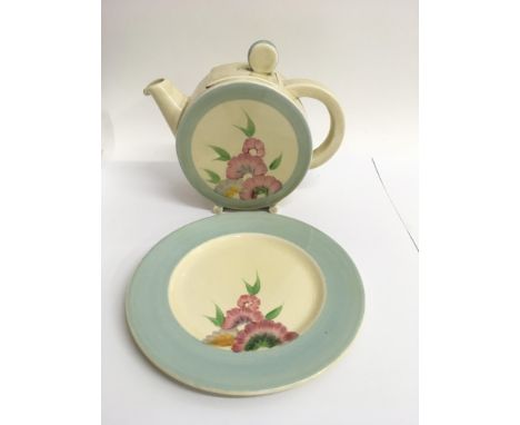 A Clarice Cliff 'Bonjour' shape teapot and side plate both painted in 'Pink Pearls' pattern