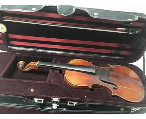 A good German violin by Louis Lowerdahl of Dresden (stamped on button) copy of Joseph Guarnerius, circa 1890. Comes in case a