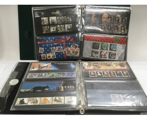 Three albums of first day covers.