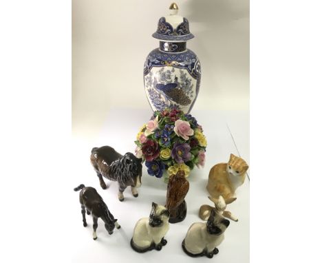 A group of Beswick and other animal models, a ceramic post and lidded peacock vase